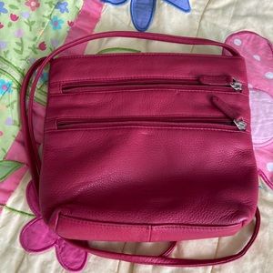 Red small Stone Mountain purse two zippers on the outside nice leather purse